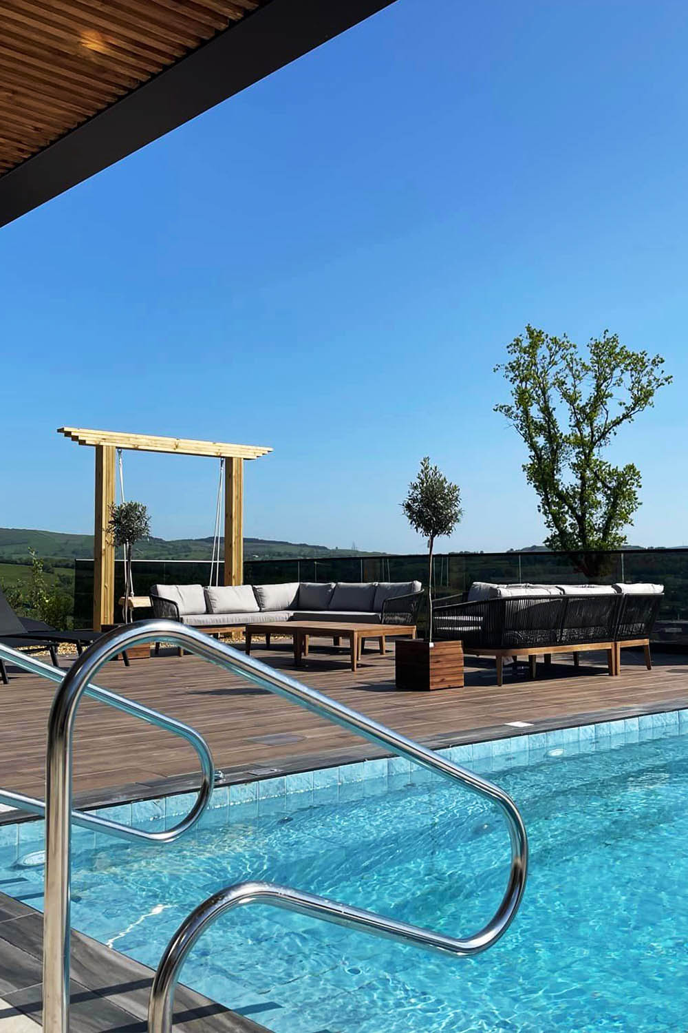 Outdoor vitality pool and loungers